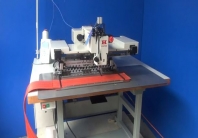75008 Máquina de coser electronica de area programmable para materiales extra pesados y hilos más gr