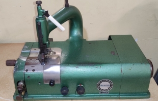 Maquina de rebajar piel Fortuna, con grupo de aspiración y motor de embrague. 
