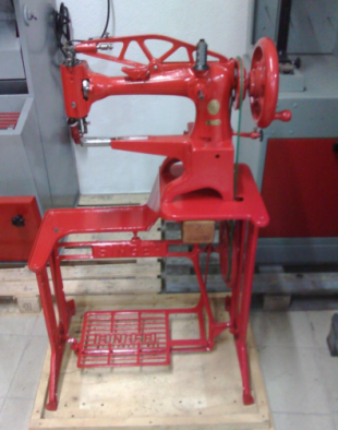 Máquina de coser remendona SINGER color rojo 